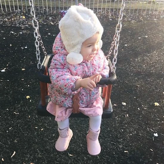 baby on swing