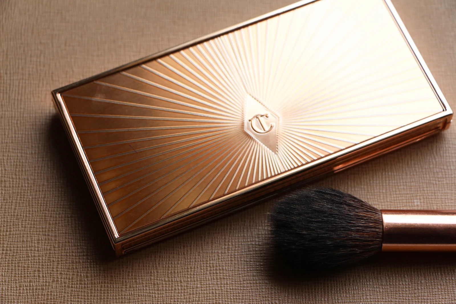 charlotte tilbury filmstar bronze and glow review